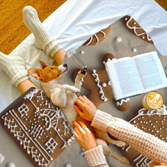 Decorated gingerbread houses and cookie figures on neutral background, view 3.
