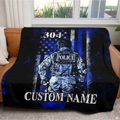Close-up of tactical helmet graphic and navy blue stripes on bedroom centerpiece.