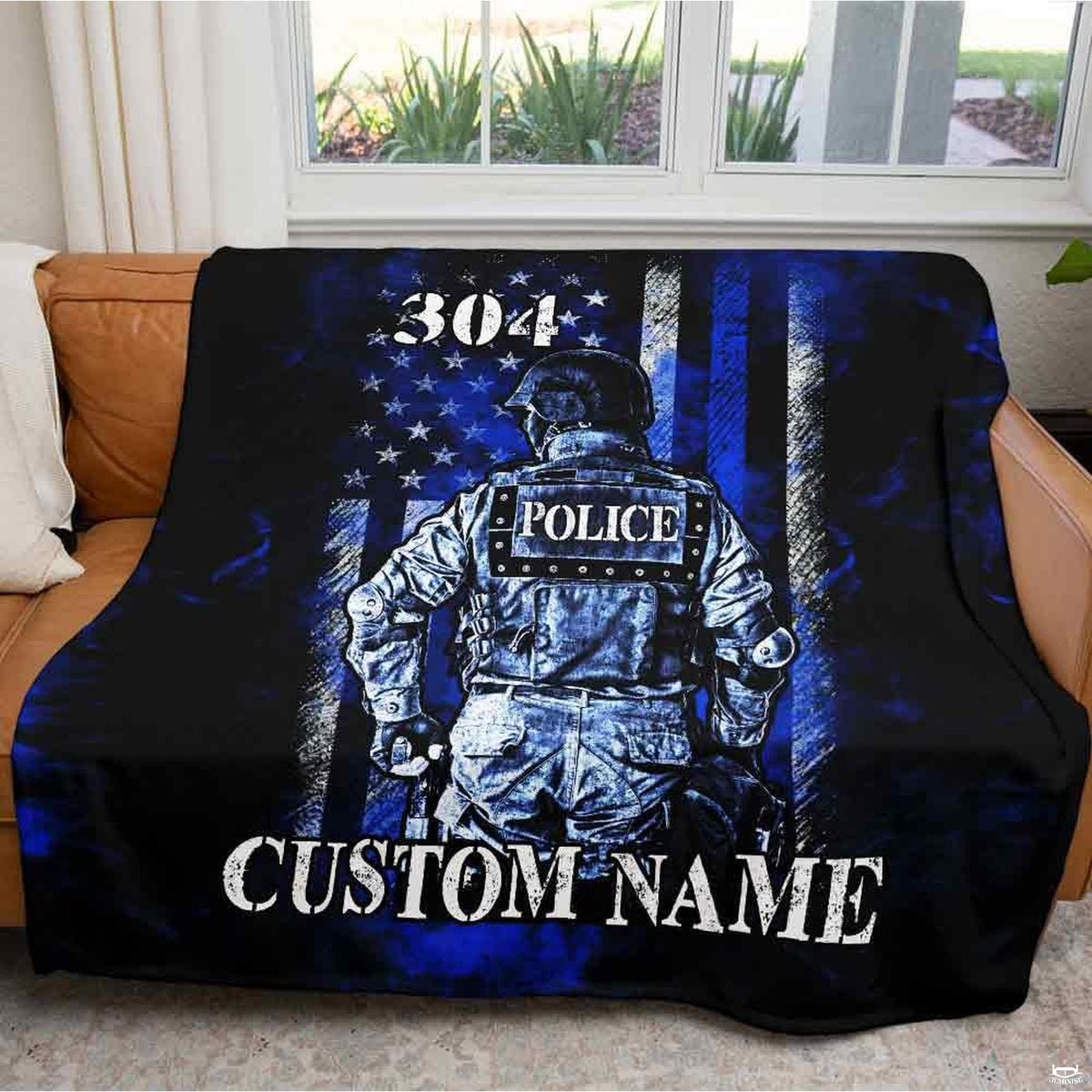 Close-up of tactical helmet graphic and navy blue stripes on bedroom centerpiece.