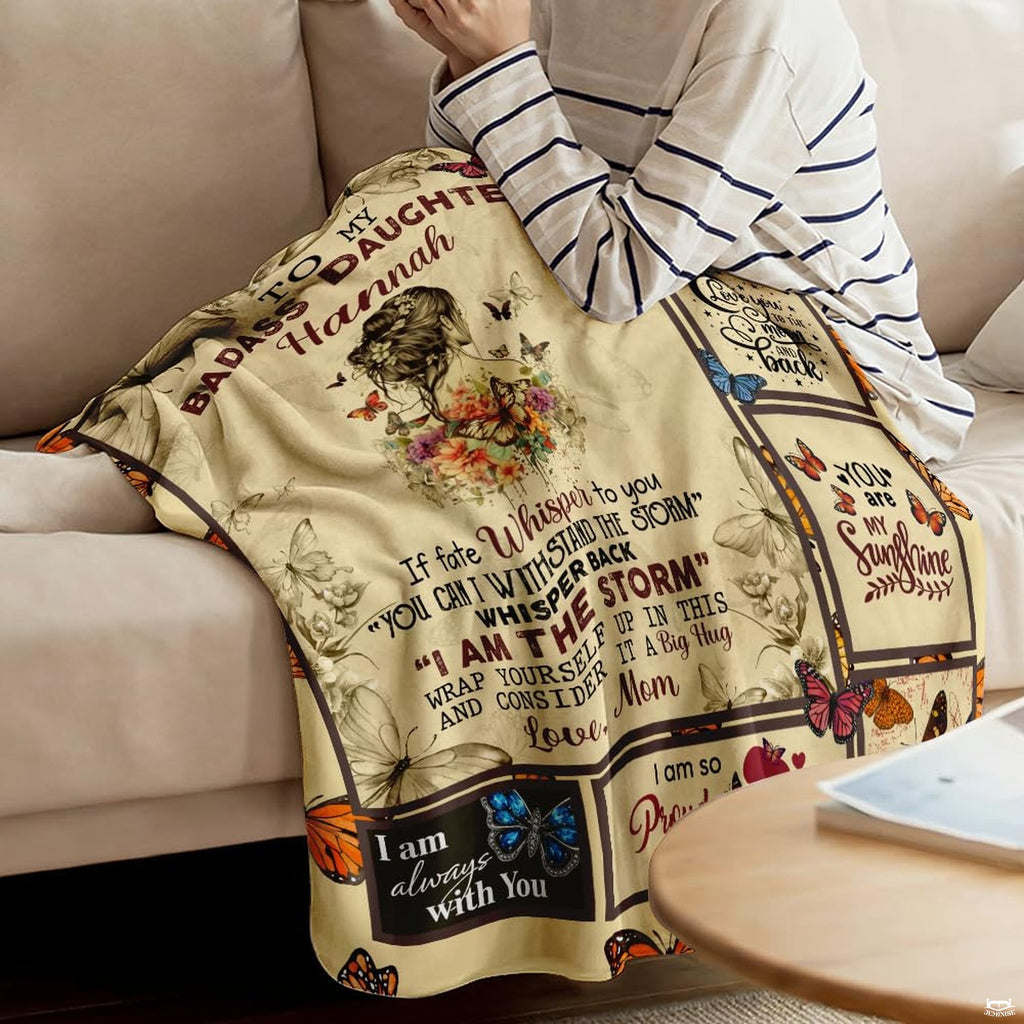 Close-up of illustrated young woman portrait with floral hair accents and butterfly graphics on a blanket