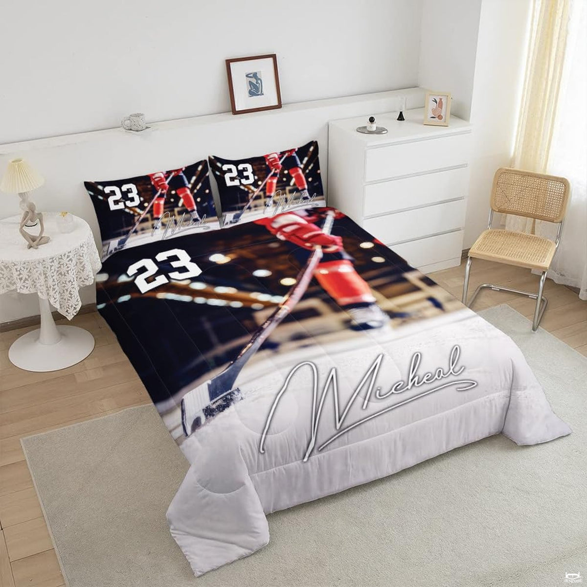 Close-up perspective of hockey bedding highlighting goalie silhouette, ice spray effects, and equipment graphics