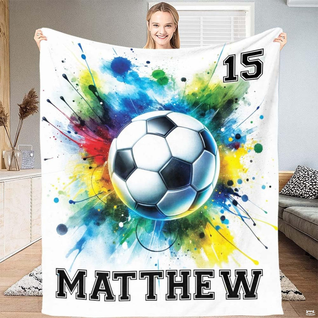 Soccer ball watercolor splash artwork in turquoise, royal blue, crimson, and bright yellow-green on white background.