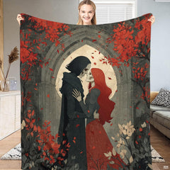 Gothic skeleton lovers throw blanket featuring embracing couple under stone cathedral arch with red ivy