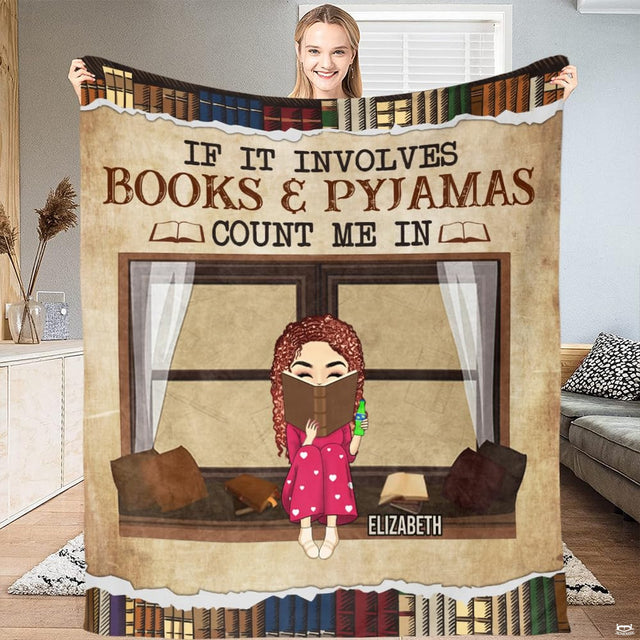 Living room staging of reader girl throw blanket draped over an armchair beside a side table.