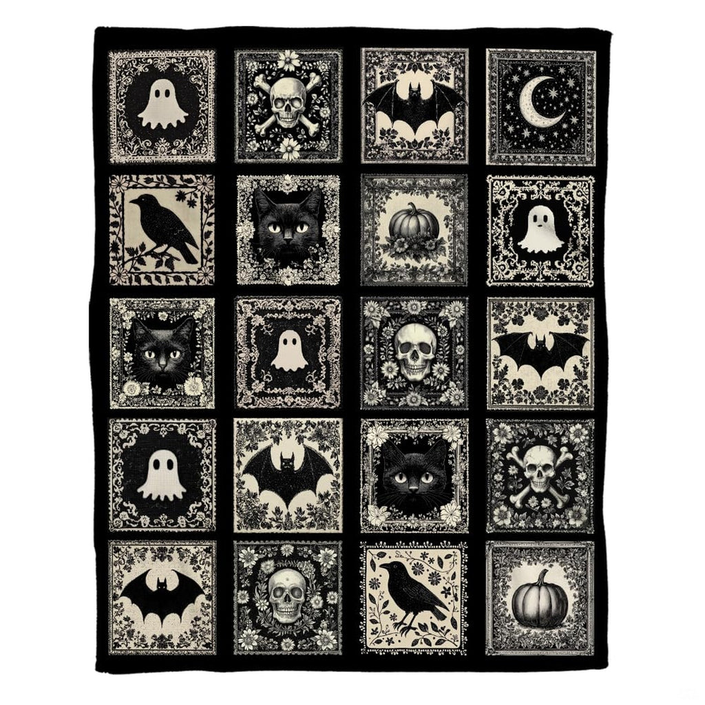 Gothic cameo throw blanket featuring black and cream tiled skulls, ghosts, bats, and ravens.