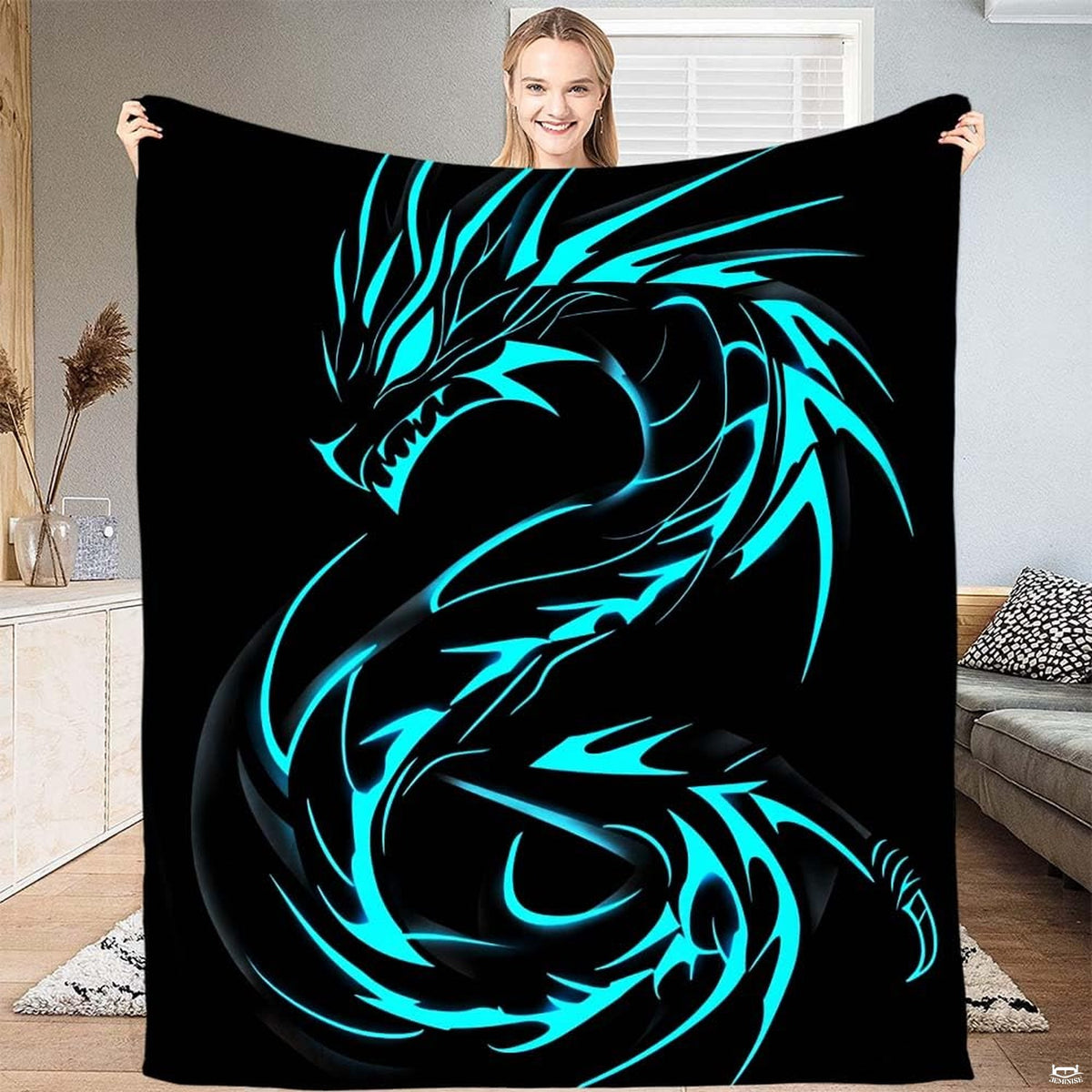 Bedroom interior display showing electric cyan dragon throw blanket styled on modern accent seating