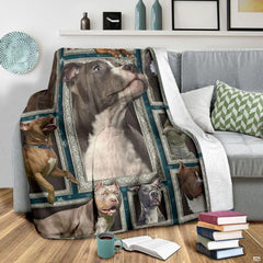 Outdoor view of a model holding up the full Pit Bull Terrier gallery throw blanket.
