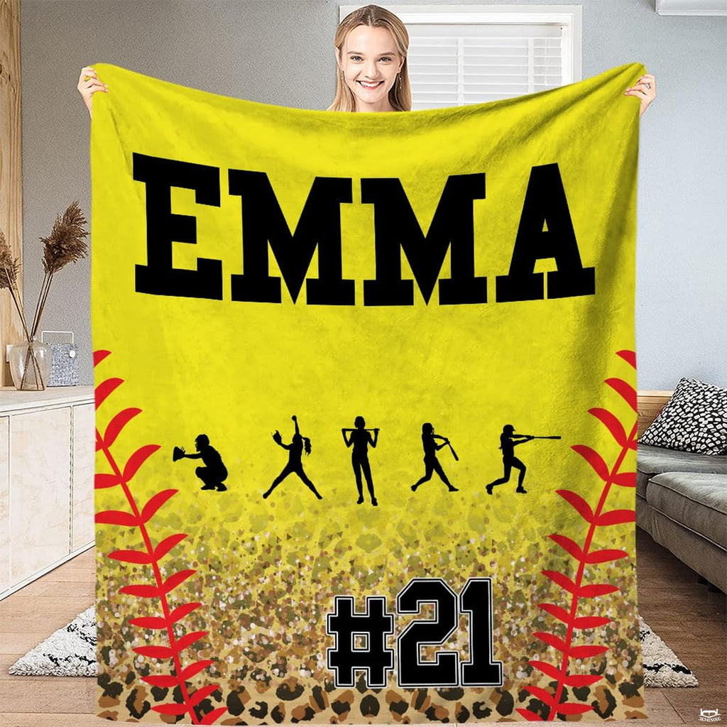 Fastpitch softball cheetah print yellow blanket displayed against white background