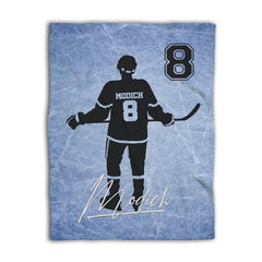 Ice rink texture background graphic with skater silhouette and script signature detail