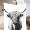 Rustic highland cow bedding set featuring black and white cattle artwork against white background