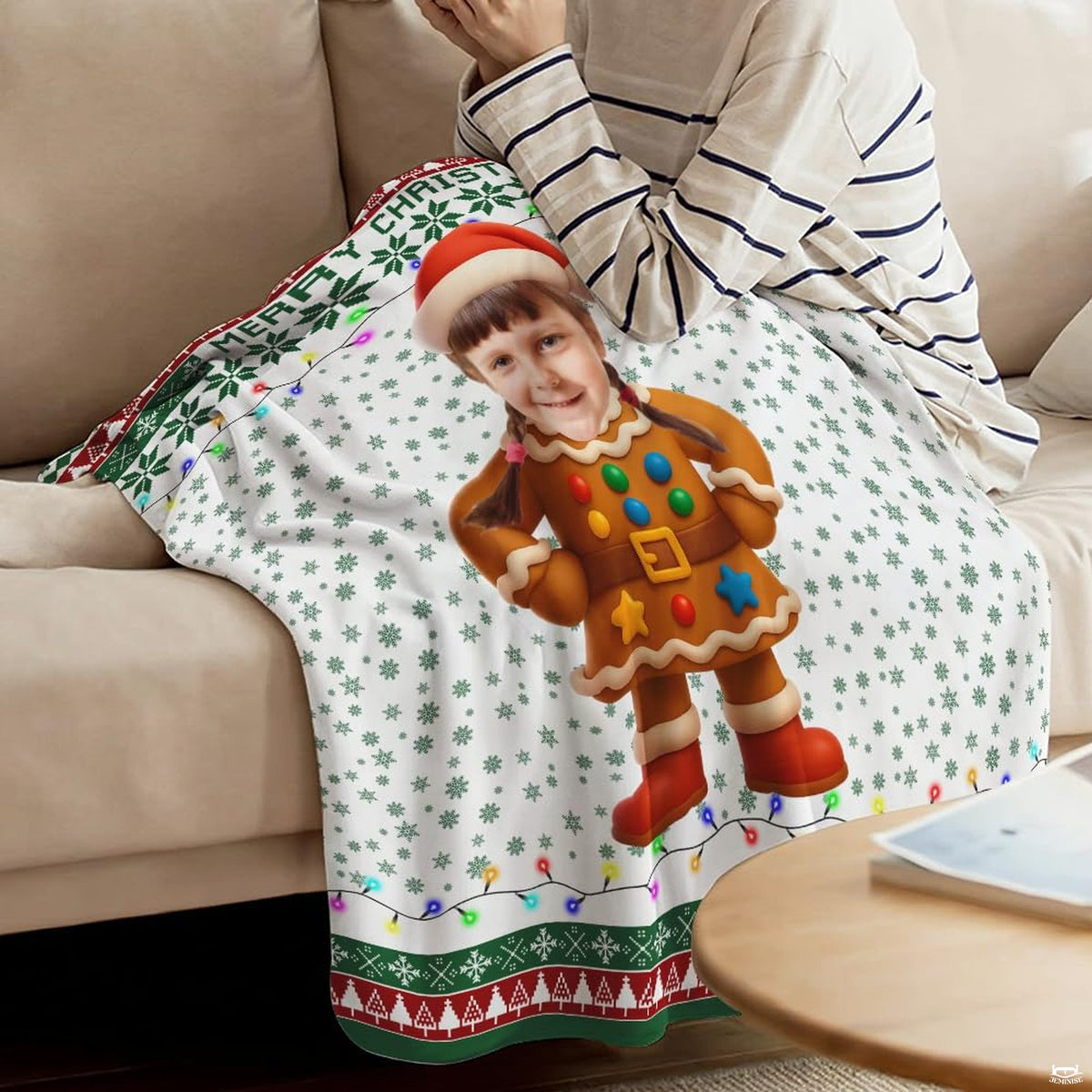 Detailed view of colorful candy button accents and white icing trim on gingerbread character