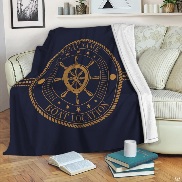 Ship wheel helm gold navy throw blanket held open showing metallic gold seafaring graphic artwork
