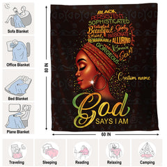 Detail of red patterned headwrap, gold calligraphy, and tribal mudcloth background on a blanket