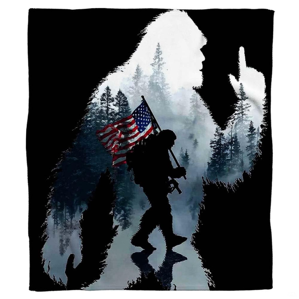Patriotic Sasquatch throw blanket draped over a contemporary living room sofa