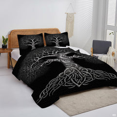 Overhead view of black and white Celtic tree bedding arranged on a contemporary bedroom wooden bed frame