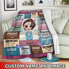 Praying girl scripture affirmations blanket held outdoors in autumn park
