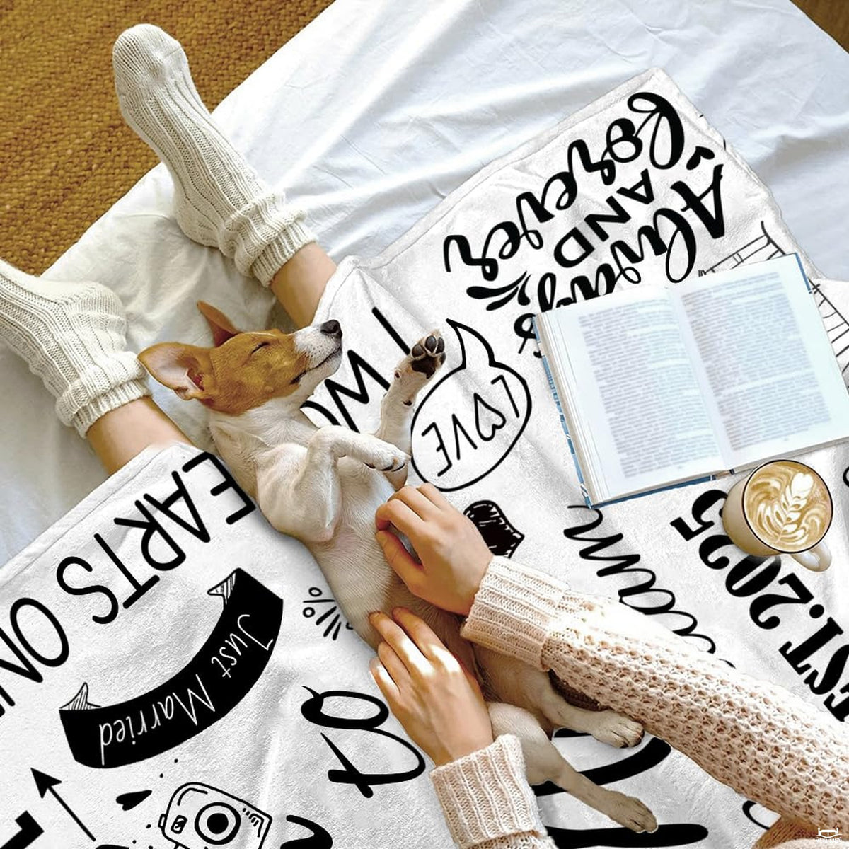 Side angle view of wedding chapel and champagne glasses on throw blanket