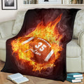 Blazing inferno gridiron football blanket draped over sofa