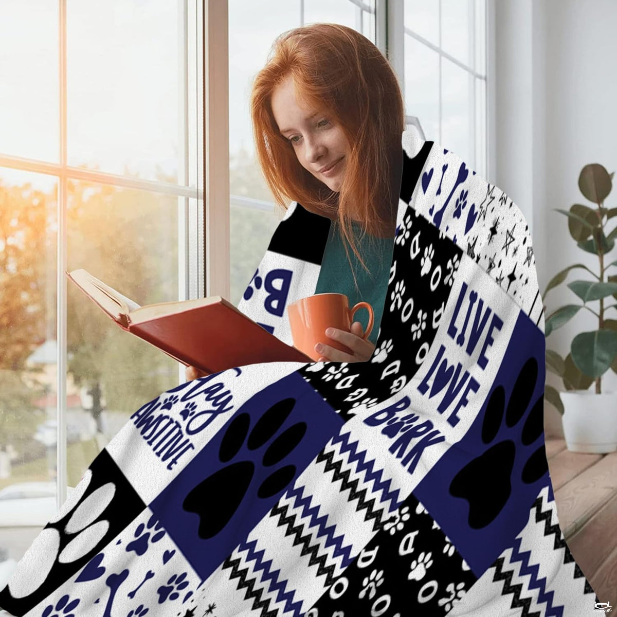 Navy dog paw print throw blanket view 4 highlighting patchwork pattern squares, bones, and stripes
