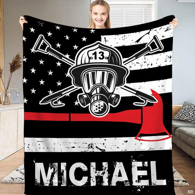 Thin Red Line firefighter throw blanket with American flag, helmet, respirator mask, and red axe