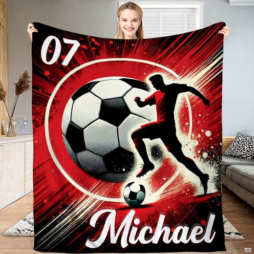 Dynamic soccer player silhouette and graphic soccer ball with red speed lines throw blanket