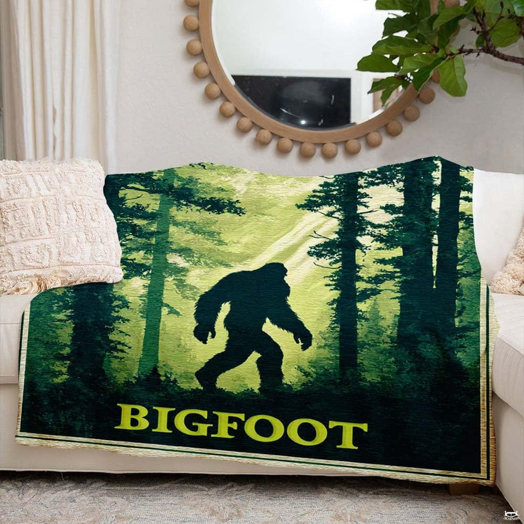 Sasquatch forest throw blanket view 6 highlighting evergreen trees, sunbeams, and rustic poster borders