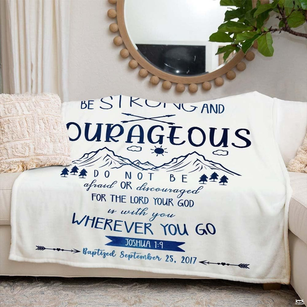 Mountain bedding kids room styling showing navy and sky blue adventure artwork in a bright setting.