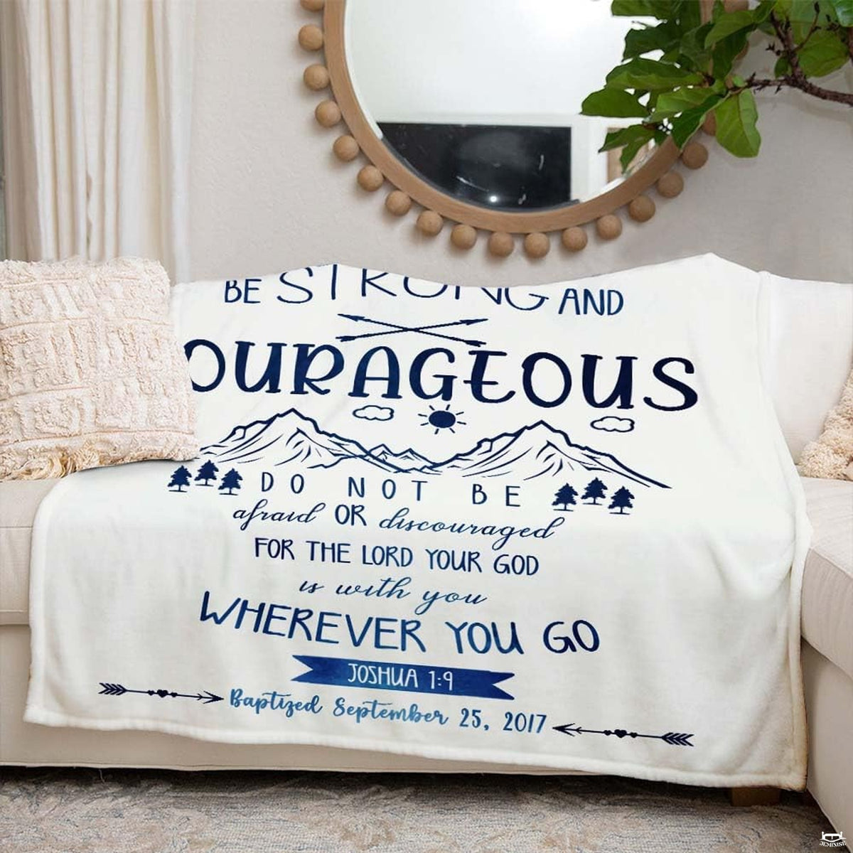 Mountain bedding kids room styling showing navy and sky blue adventure artwork in a bright setting.