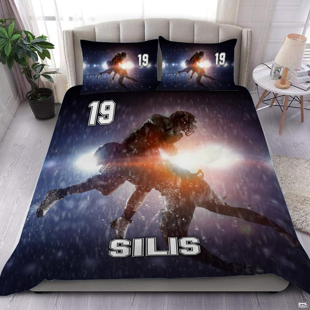 Royal blue football sports bedding featuring textured football graphic and yard lines on a bed