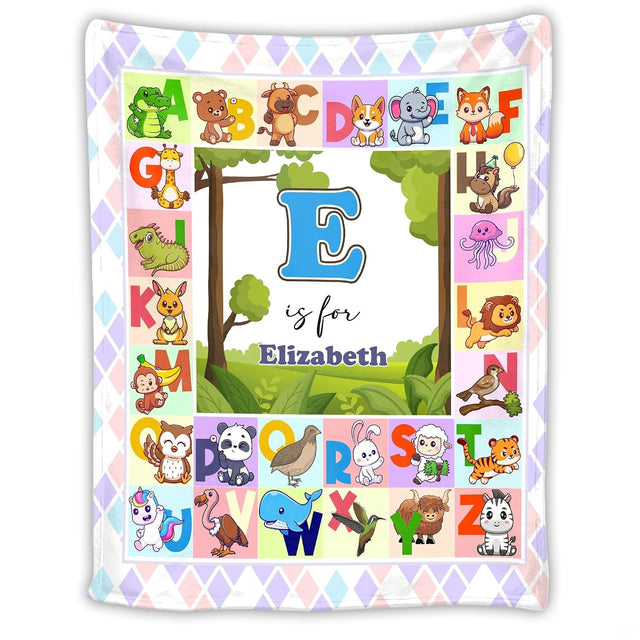 Illustrated A to Z cute animal alphabet chart surrounding central woodland meadow landscape, view 1.