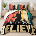 Rustic mountain Bigfoot graphic bedding set displayed in a timber cabin bedroom setting.