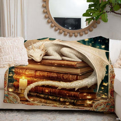 Styling view of mythological dragon reading art draped across an indoor sofa.