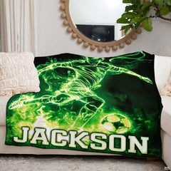 Glowing green soccer graphic textile draped over living room couch