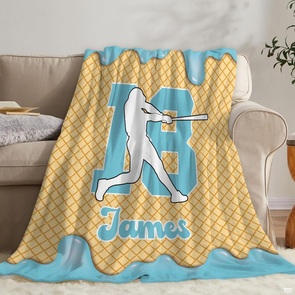 Full flat hanging view of the angel wings and heart frame memorial blanket.