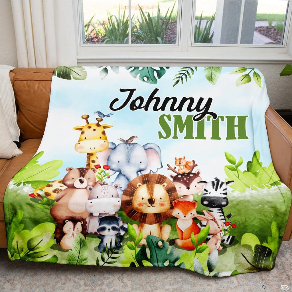 Atmospheric playroom couch setting featuring colorful watercolor safari and woodland throw blanket