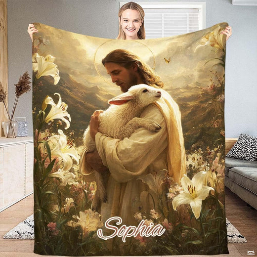 Good Shepherd Jesus blanket featuring Christ holding a lamb surrounded by white lilies.
