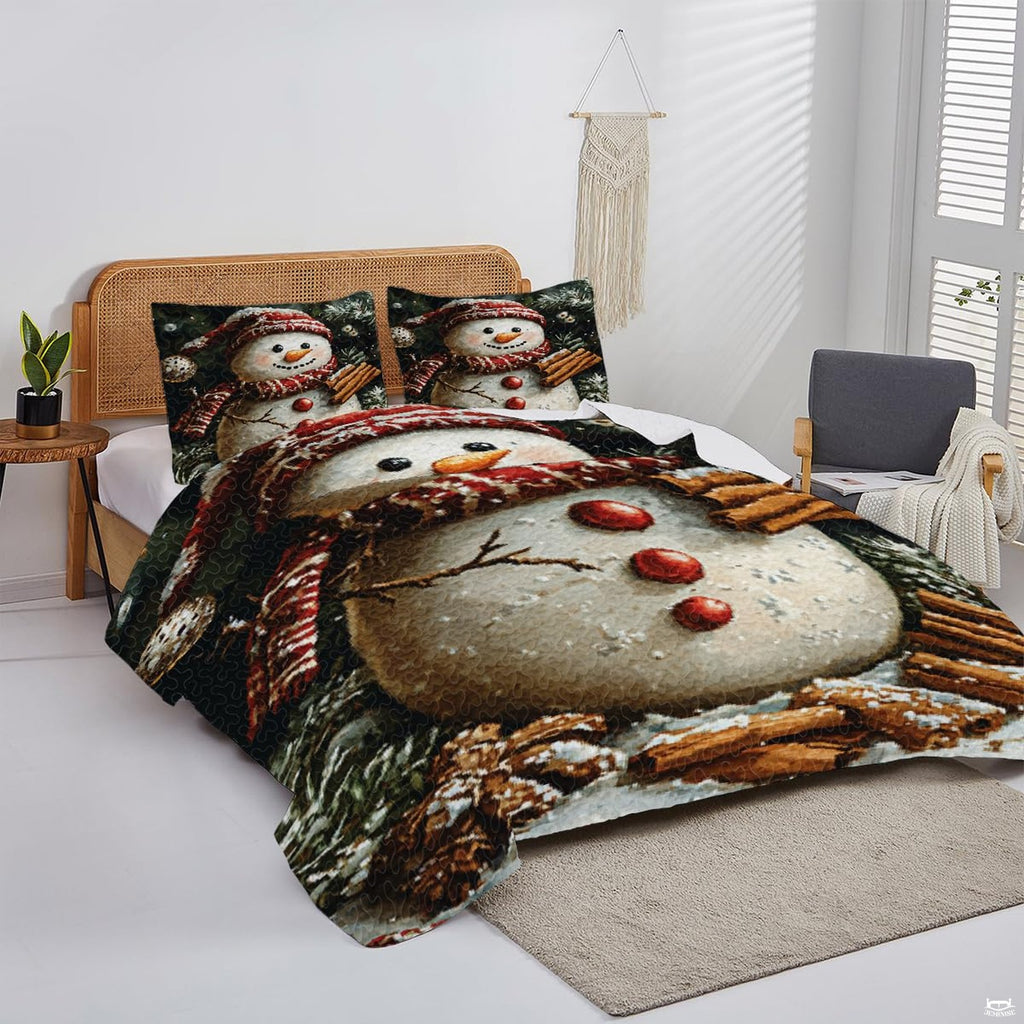 Overhead perspective of winter bedding arranged neatly across a holiday guest room mattress