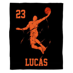 MD sports slam dunk basketball bedding set featuring an airborne player silhouette in vivid orange on black.