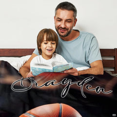 Close-up perspective of textured basketball and wooden planks on throw blanket