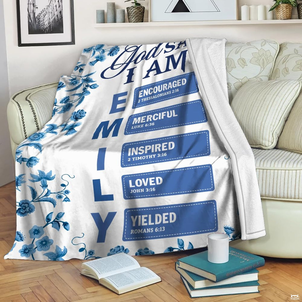 Close-up of the blue floral botanical border, navy Scripture calligraphy, and Bible chapter citations on a blanket