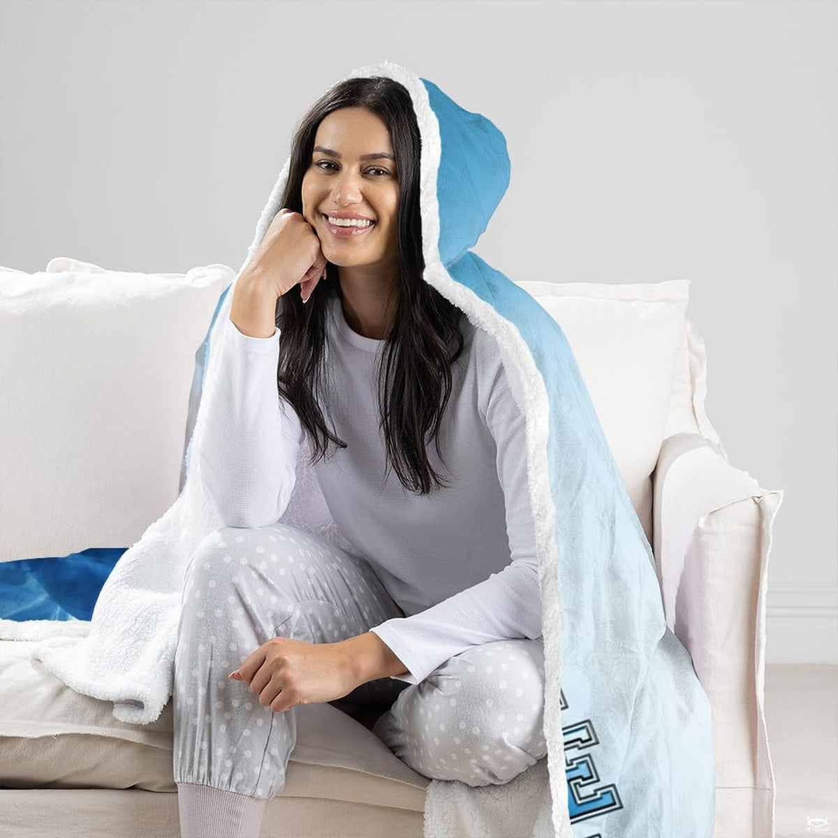 thematic accent perspective of athletic football bedding set coordinating with sports bedroom decor.