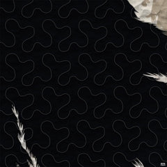 Close-up view of Bigfoot bedding showcasing cream parchment background, pine trees, and Sasquatch silhouette