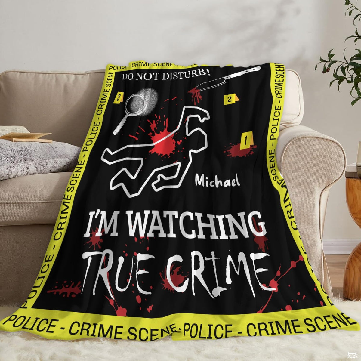 Crime scene throw blanket draped over living room sofa beneath round wall mirror