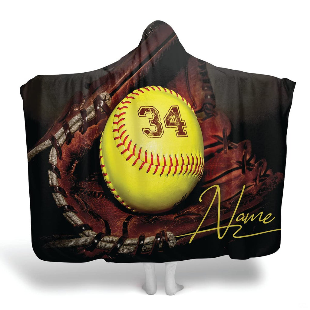 Optic yellow softball resting in brown catcher glove with athletic numerals and script accent, view 1.