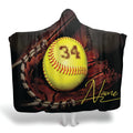 Optic yellow softball resting in brown catcher glove with athletic numerals and script accent, view 1.