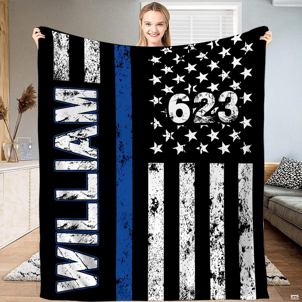 Thin striped bedding set showing distressed American flag graphic with vivid blue accent on black.
