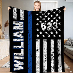 Thin striped bedding set showing distressed American flag graphic with vivid blue accent on black.