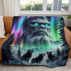 Textile arranged on living room couch displaying cosmic Sasquatch and three wolves in snow.