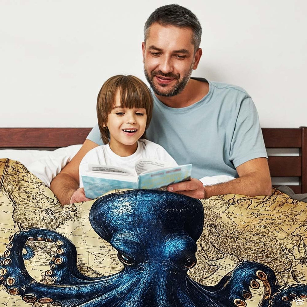 Vintage cartography background with deep blue octopus tentacle motif on maritime bedding in a bright bedroom.