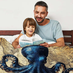 Vintage cartography background with deep blue octopus tentacle motif on maritime bedding in a bright bedroom.